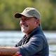 Mark Wilson on a river with his fishing kayak